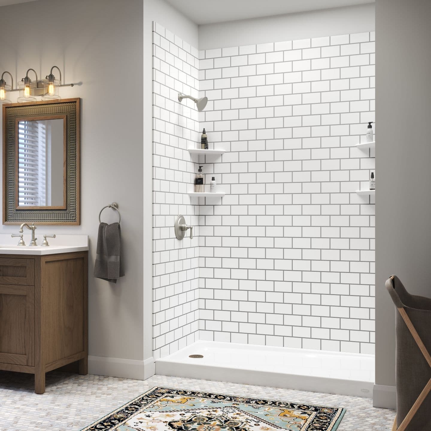 Modern bathroom with white subway tiles in the shower, featuring corner shelves. Wooden vanity, ornate mirror, soft lighting, and decorative rug.